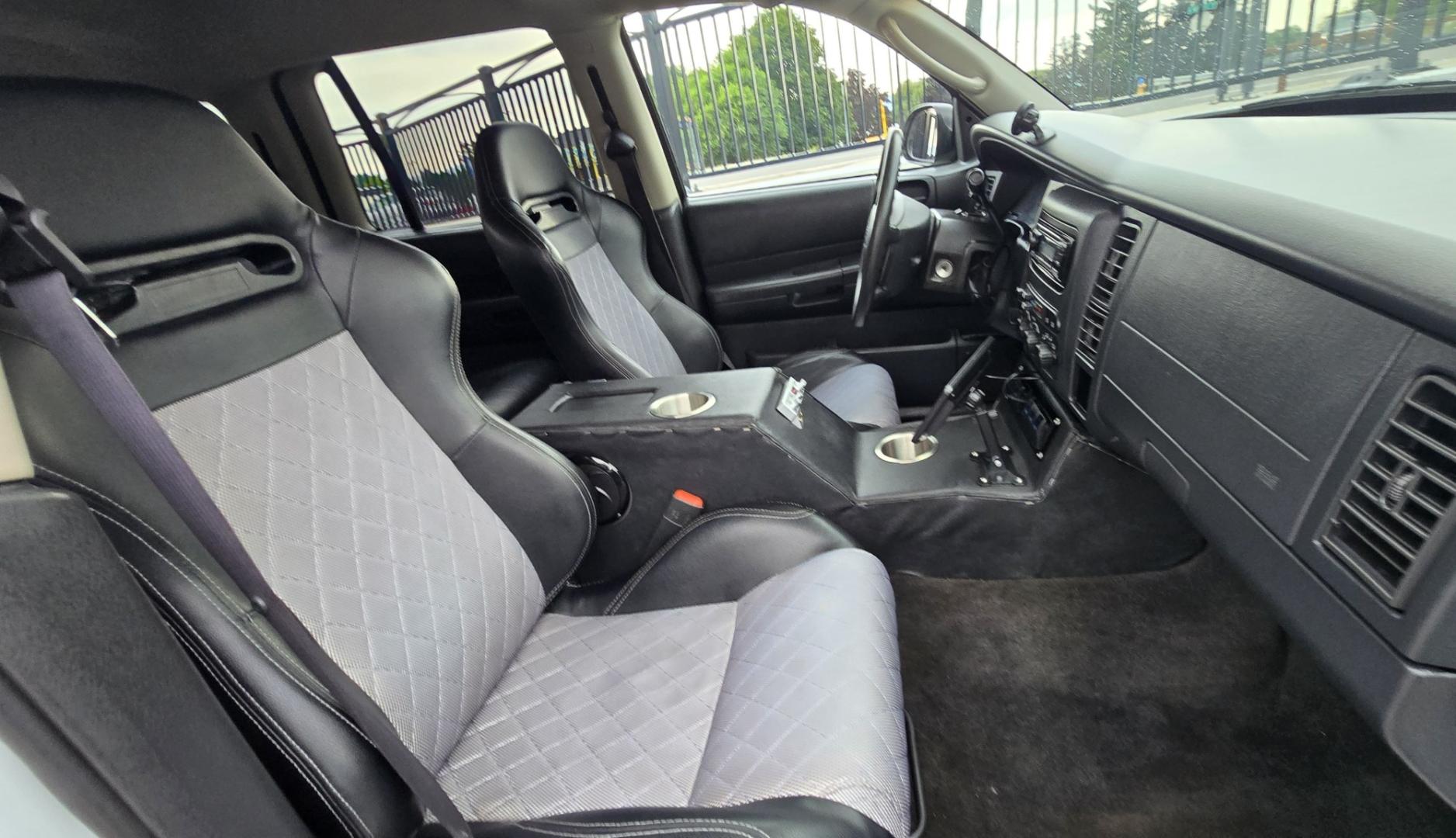 2003 White /Black Dodge Durango SLT 4WD (1D4HS48N03F) with an 4.7L V8 SOHC 16V engine, located at 450 N Russell, Missoula, MT, 59801, (406) 543-6600, 46.874496, -114.017433 - Ready to Go Four Wheeling! Excellent Running 4WD SUV. 4.7L V8 Engine. Automatic Transmission. Aftermarket Front and rear Bumper. Racing Front Seats. 3rd Row Seating. Aftermarket Stereo with Add On Touch Screen. Bluetooth. Air Conditioning. Power Windows and Locks.- Photo#11