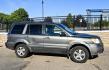 2007 Grey /Gray Honda Pilot EX-L 4WD w/ DVD (2HKYF18607H) with an 3.5L V6 SOHC 24V engine, 5A OD transmission, located at 450 N Russell, Missoula, MT, 59801, (406) 543-6600, 46.874496, -114.017433 - Here's you chance to buy a AWD SUV Honda that runs great for a great price. Lots of miles but you wouldn't know it by how it runs. 3.5L V6 Engine. 3rd Row Seating. Rear Entertainment. Power Drivers Seat. Heated Front Seats. AM FM XM CD Player. Air Conditioning Blows Cold.Sunroof. Power Windows and L- Photo#1