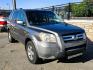 2007 Grey /Gray Honda Pilot EX-L 4WD w/ DVD (2HKYF18607H) with an 3.5L V6 SOHC 24V engine, 5A OD transmission, located at 450 N Russell, Missoula, MT, 59801, (406) 543-6600, 46.874496, -114.017433 - Here's you chance to buy a AWD SUV Honda that runs great for a great price. Lots of miles but you wouldn't know it by how it runs. 3.5L V6 Engine. 3rd Row Seating. Rear Entertainment. Power Drivers Seat. Heated Front Seats. AM FM XM CD Player. Air Conditioning Blows Cold.Sunroof. Power Windows and L- Photo#4