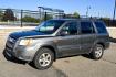 2007 Grey /Gray Honda Pilot EX-L 4WD w/ DVD (2HKYF18607H) with an 3.5L V6 SOHC 24V engine, 5A OD transmission, located at 450 N Russell, Missoula, MT, 59801, (406) 543-6600, 46.874496, -114.017433 - Here's you chance to buy a AWD SUV Honda that runs great for a great price. Lots of miles but you wouldn't know it by how it runs. 3.5L V6 Engine. 3rd Row Seating. Rear Entertainment. Power Drivers Seat. Heated Front Seats. AM FM XM CD Player. Air Conditioning Blows Cold.Sunroof. Power Windows and L- Photo#6