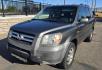 2007 Grey /Gray Honda Pilot EX-L 4WD w/ DVD (2HKYF18607H) with an 3.5L V6 SOHC 24V engine, 5A OD transmission, located at 450 N Russell, Missoula, MT, 59801, (406) 543-6600, 46.874496, -114.017433 - Here's you chance to buy a AWD SUV Honda that runs great for a great price. Lots of miles but you wouldn't know it by how it runs. 3.5L V6 Engine. 3rd Row Seating. Rear Entertainment. Power Drivers Seat. Heated Front Seats. AM FM XM CD Player. Air Conditioning Blows Cold.Sunroof. Power Windows and L- Photo#2