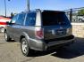 2007 Grey /Gray Honda Pilot EX-L 4WD w/ DVD (2HKYF18607H) with an 3.5L V6 SOHC 24V engine, 5A OD transmission, located at 450 N Russell, Missoula, MT, 59801, (406) 543-6600, 46.874496, -114.017433 - Here's you chance to buy a AWD SUV Honda that runs great for a great price. Lots of miles but you wouldn't know it by how it runs. 3.5L V6 Engine. 3rd Row Seating. Rear Entertainment. Power Drivers Seat. Heated Front Seats. AM FM XM CD Player. Air Conditioning Blows Cold.Sunroof. Power Windows and L- Photo#7