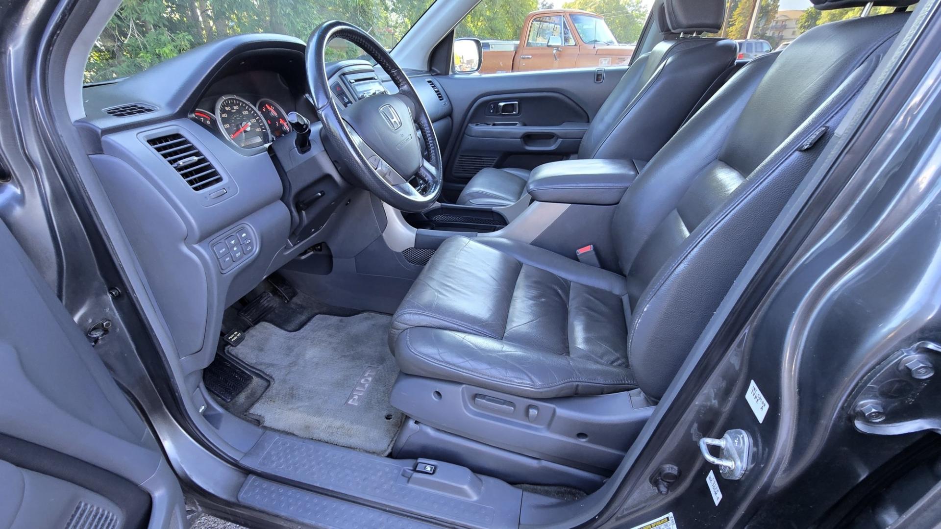 2007 Grey /Gray Honda Pilot EX-L 4WD w/ DVD (2HKYF18607H) with an 3.5L V6 SOHC 24V engine, 5A OD transmission, located at 450 N Russell, Missoula, MT, 59801, (406) 543-6600, 46.874496, -114.017433 - Here's you chance to buy a AWD SUV Honda that runs great for a great price. Lots of miles but you wouldn't know it by how it runs. 3.5L V6 Engine. 3rd Row Seating. Rear Entertainment. Power Drivers Seat. Heated Front Seats. AM FM XM CD Player. Air Conditioning Blows Cold.Sunroof. Power Windows and L- Photo#11