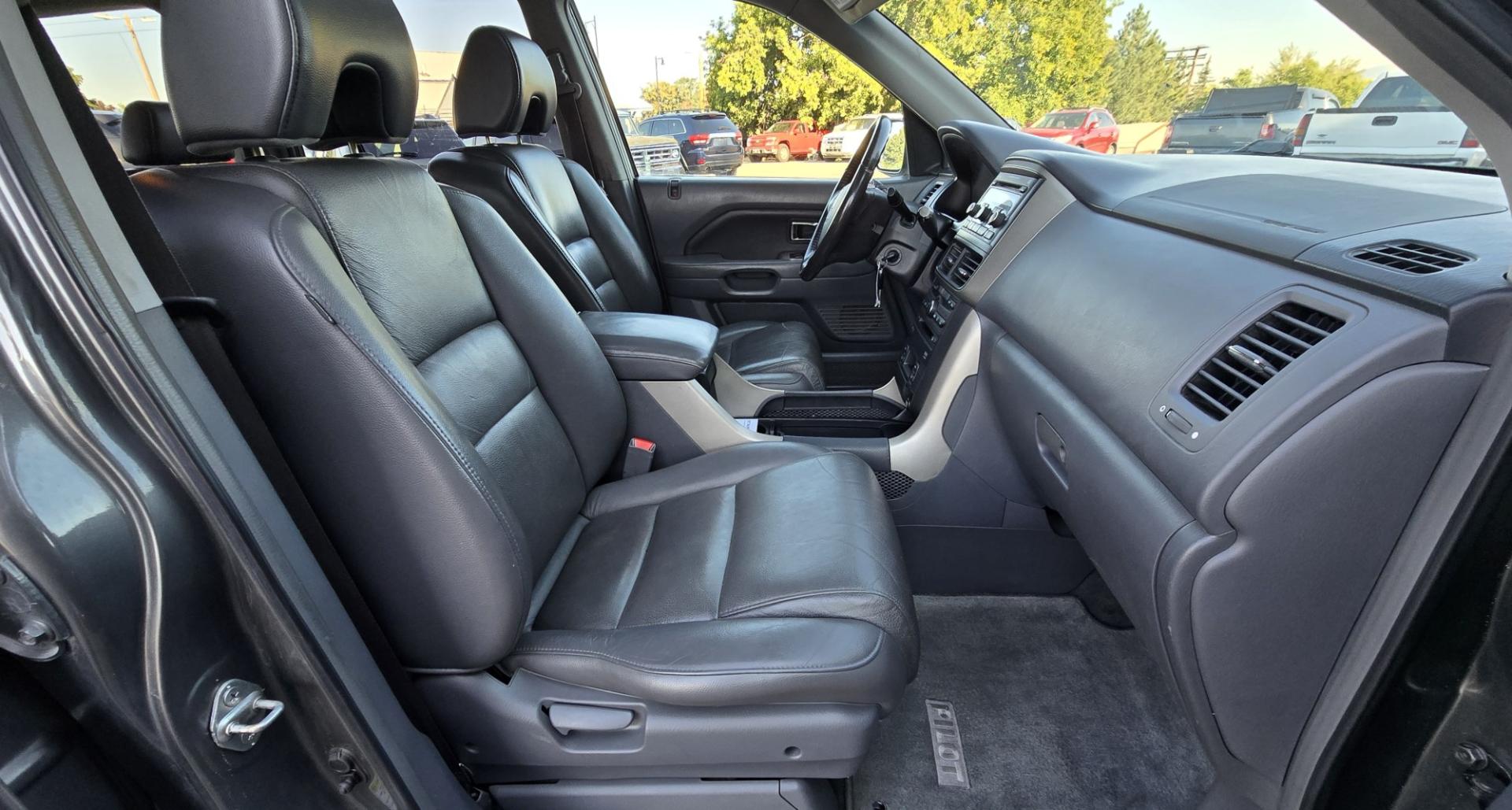 2007 Grey /Gray Honda Pilot EX-L 4WD w/ DVD (2HKYF18607H) with an 3.5L V6 SOHC 24V engine, 5A OD transmission, located at 450 N Russell, Missoula, MT, 59801, (406) 543-6600, 46.874496, -114.017433 - Here's you chance to buy a AWD SUV Honda that runs great for a great price. Lots of miles but you wouldn't know it by how it runs. 3.5L V6 Engine. 3rd Row Seating. Rear Entertainment. Power Drivers Seat. Heated Front Seats. AM FM XM CD Player. Air Conditioning Blows Cold.Sunroof. Power Windows and L- Photo#15