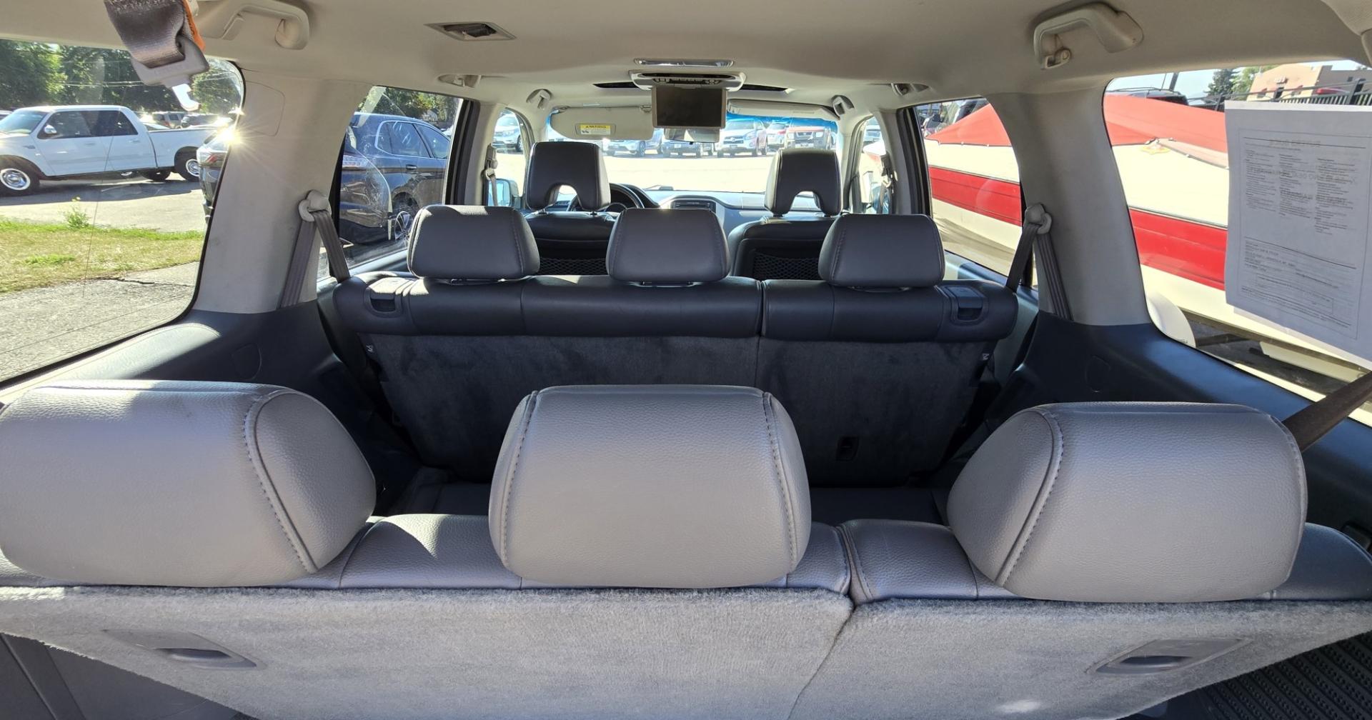 2007 Grey /Gray Honda Pilot EX-L 4WD w/ DVD (2HKYF18607H) with an 3.5L V6 SOHC 24V engine, 5A OD transmission, located at 450 N Russell, Missoula, MT, 59801, (406) 543-6600, 46.874496, -114.017433 - Here's you chance to buy a AWD SUV Honda that runs great for a great price. Lots of miles but you wouldn't know it by how it runs. 3.5L V6 Engine. 3rd Row Seating. Rear Entertainment. Power Drivers Seat. Heated Front Seats. AM FM XM CD Player. Air Conditioning Blows Cold.Sunroof. Power Windows and L- Photo#16