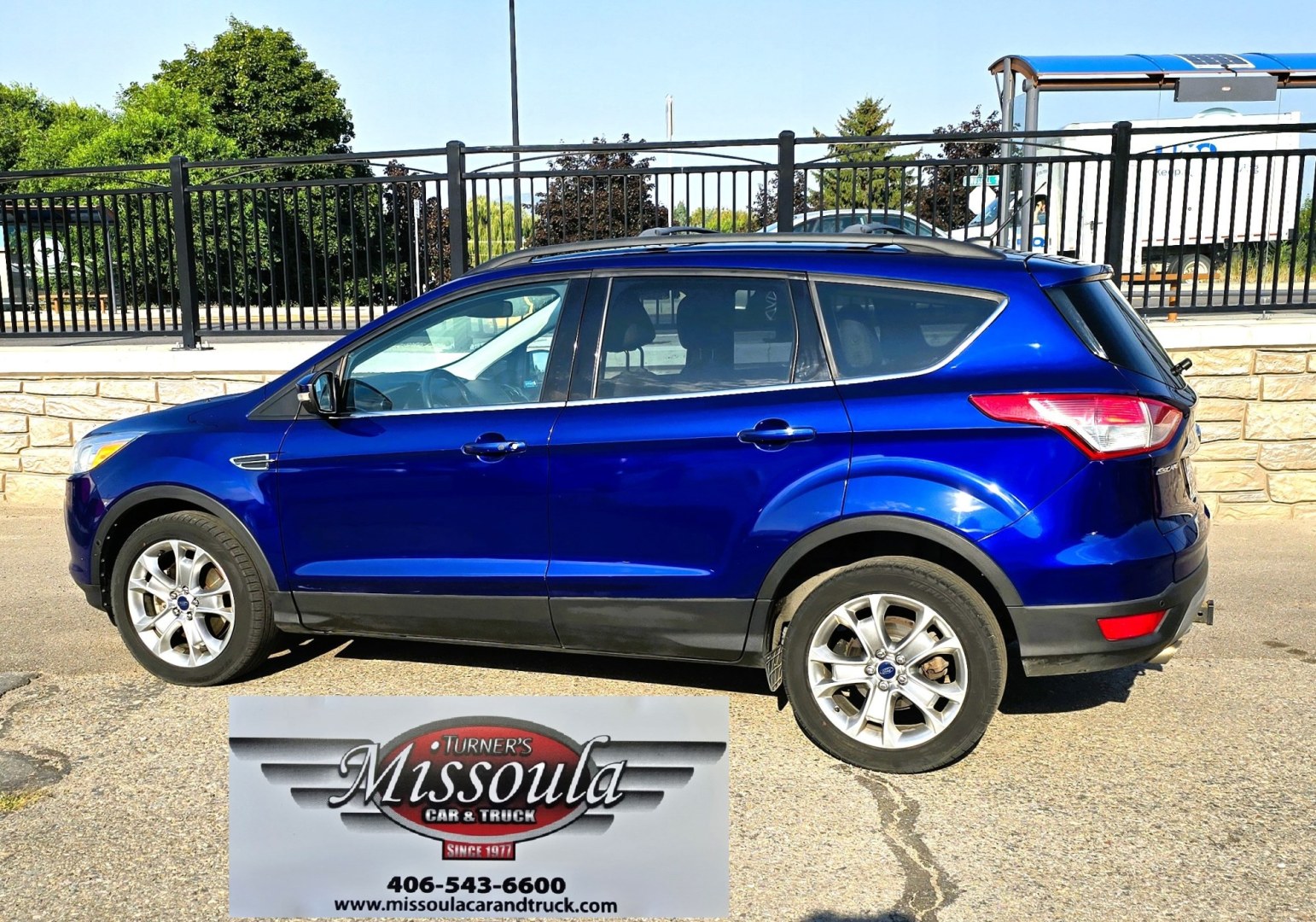 2013 Blue /Tan Ford Escape SEL 4WD (1FMCU9H96DU) with an 2.0L L4 DOHC 16V engine, 6-Speed Automatic transmission, located at 450 N Russell, Missoula, MT, 59801, (406) 543-6600, 46.874496, -114.017433 - Classy Blue Economy Two Owner AWD SUV. 2.0L I4 Engine. 6 Speed Select Shift Automatic Transmission. Navigation. AM FM XM Sync Stereo with CD Player. Bluetooth Audio and Phone Connection. Air Conditioning. Tilt and Telescoping Steering. Backup Camera. Backup Camera. Roof Rack. Towing. Parking Sensors- Photo#4