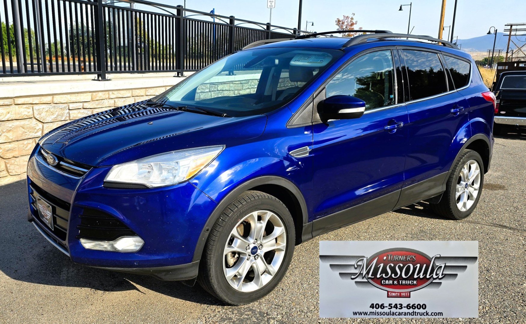 2013 Blue /Tan Ford Escape SEL 4WD (1FMCU9H96DU) with an 2.0L L4 DOHC 16V engine, 6-Speed Automatic transmission, located at 450 N Russell, Missoula, MT, 59801, (406) 543-6600, 46.874496, -114.017433 - Classy Blue Economy Two Owner AWD SUV. 2.0L I4 Engine. 6 Speed Select Shift Automatic Transmission. Navigation. AM FM XM Sync Stereo with CD Player. Bluetooth Audio and Phone Connection. Air Conditioning. Tilt and Telescoping Steering. Backup Camera. Backup Camera. Roof Rack. Towing. Parking Sensors- Photo#6
