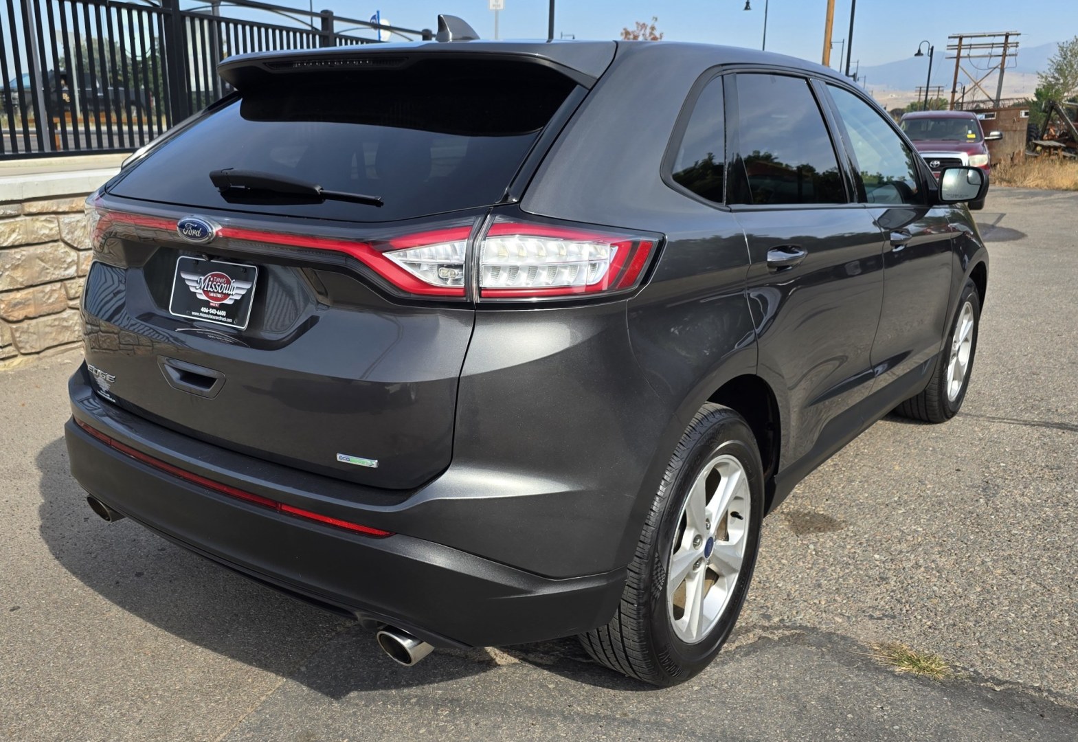 2015 Grey /Gray Ford Edge SE FWD (2FMTK3G92FB) with an 2.0L L4 DOHC 16V engine, 6A transmission, located at 450 N Russell, Missoula, MT, 59801, (406) 543-6600, 46.874496, -114.017433 - Clean Front Wheel Drive SUV with Good Miles for it's age. 2.0L I4 Engine. 6 Speed Automatic Transmission. Air Conditioning. Cruise Control. Power Windows and Locks. Backup Camera. AM FM CD Player with Bluetooth and Microsoft Sync. Clean Title and Carfax.- Photo#5