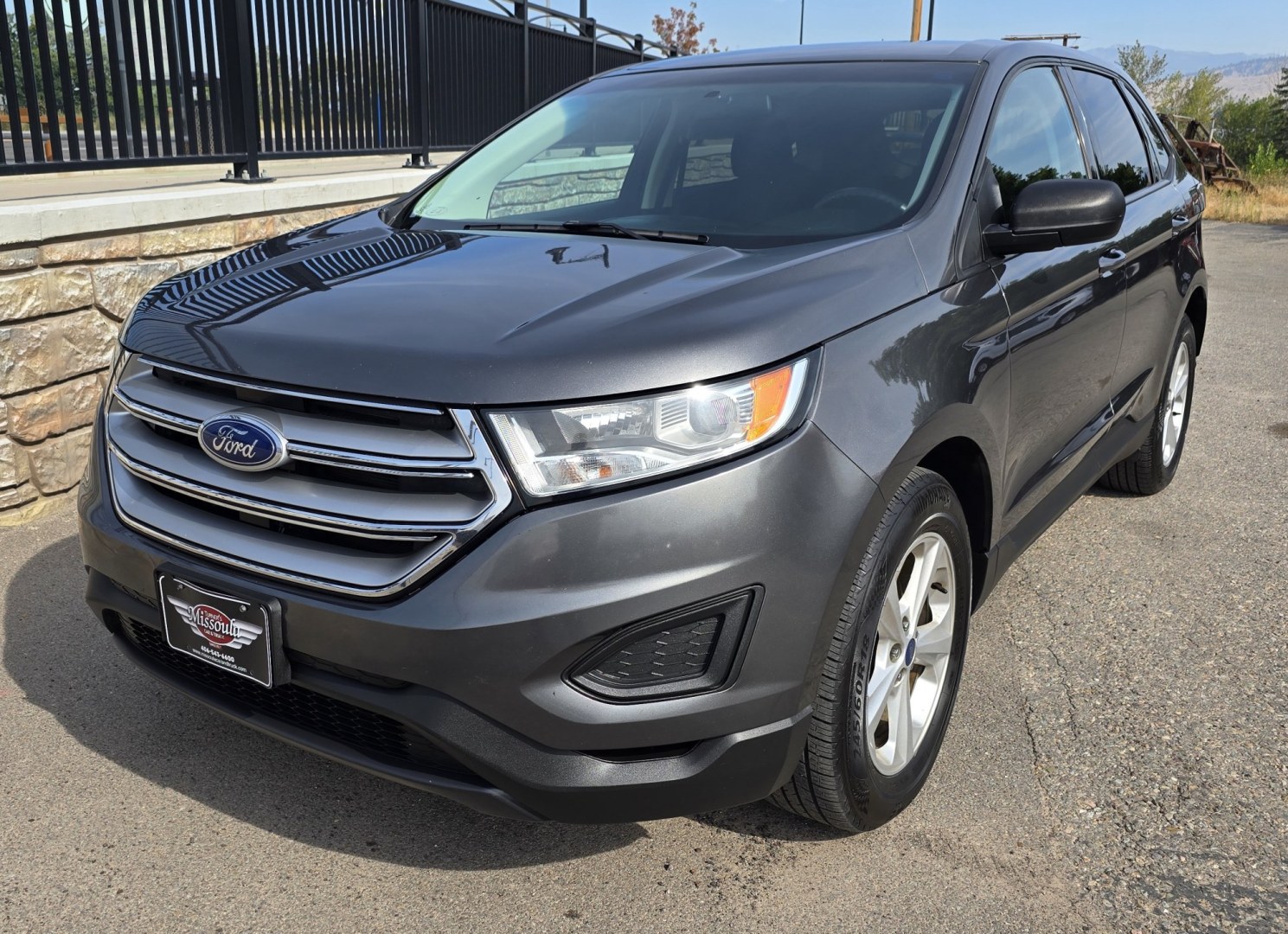 2015 Grey /Gray Ford Edge SE FWD (2FMTK3G92FB) with an 2.0L L4 DOHC 16V engine, 6A transmission, located at 450 N Russell, Missoula, MT, 59801, (406) 543-6600, 46.874496, -114.017433 - Clean Front Wheel Drive SUV with Good Miles for it's age. 2.0L I4 Engine. 6 Speed Automatic Transmission. Air Conditioning. Cruise Control. Power Windows and Locks. Backup Camera. AM FM CD Player with Bluetooth and Microsoft Sync. Clean Title and Carfax.- Photo#8