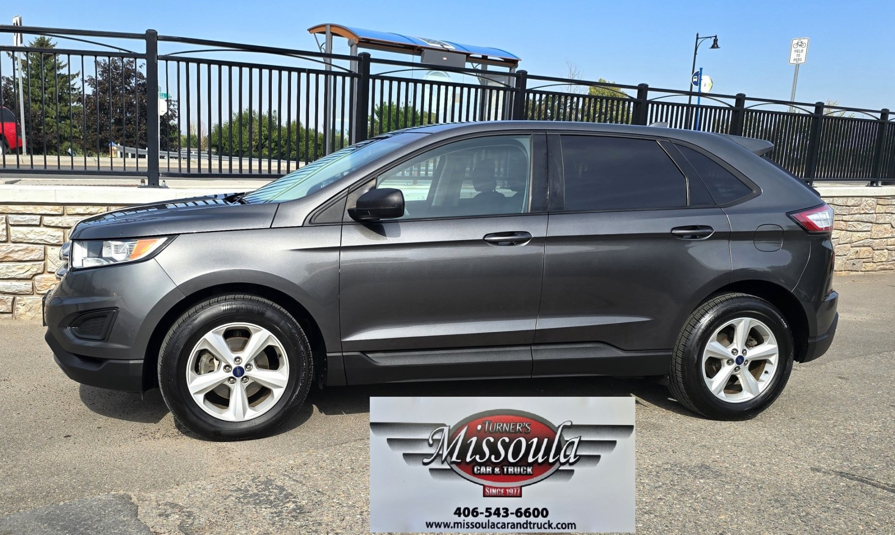 2015 Grey /Gray Ford Edge SE FWD (2FMTK3G92FB) with an 2.0L L4 DOHC 16V engine, 6A transmission, located at 450 N Russell, Missoula, MT, 59801, (406) 543-6600, 46.874496, -114.017433 - Clean Front Wheel Drive SUV with Good Miles for it's age. 2.0L I4 Engine. 6 Speed Automatic Transmission. Air Conditioning. Cruise Control. Power Windows and Locks. Backup Camera. AM FM CD Player with Bluetooth and Microsoft Sync. Clean Title and Carfax.- Photo#0