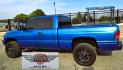 2001 Blue /Gray Dodge Ram 1500 Quad Cab short Bed 4WD (3B7HF13Z21G) with an 5.9L V8 OHV 16V engine, Automatic transmission, located at 450 N Russell, Missoula, MT, 59801, (406) 543-6600, 46.874496, -114.017433 - Nice Shiny Blue 4x4 Dodge with a 360 V8 (5.9L) Automatic Transmission. Nice Fuel Brand Wheels. Air Conditioning. Power Windows and Locks. Cruise Control. Clean Interior. Runs and Drives Great. Ready for you to Chrome Out or leave the way she looks, which is Fantastic.- Photo#2