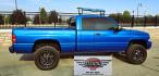 2001 Blue /Gray Dodge Ram 1500 Quad Cab short Bed 4WD (3B7HF13Z21G) with an 5.9L V8 OHV 16V engine, Automatic transmission, located at 450 N Russell, Missoula, MT, 59801, (406) 543-6600, 46.874496, -114.017433 - Nice Shiny Blue 4x4 Dodge with a 360 V8 (5.9L) Automatic Transmission. Nice Fuel Brand Wheels. Air Conditioning. Power Windows and Locks. Cruise Control. Clean Interior. Runs and Drives Great. Ready for you to Chrome Out or leave the way she looks, which is Fantastic.- Photo#6