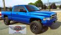 2001 Blue /Gray Dodge Ram 1500 Quad Cab short Bed 4WD (3B7HF13Z21G) with an 5.9L V8 OHV 16V engine, Automatic transmission, located at 450 N Russell, Missoula, MT, 59801, (406) 543-6600, 46.874496, -114.017433 - Nice Shiny Blue 4x4 Dodge with a 360 V8 (5.9L) Automatic Transmission. Nice Fuel Brand Wheels. Air Conditioning. Power Windows and Locks. Cruise Control. Clean Interior. Runs and Drives Great. Ready for you to Chrome Out or leave the way she looks, which is Fantastic.- Photo#8