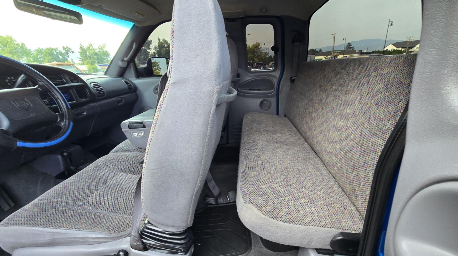 2001 Blue /Gray Dodge Ram 1500 Quad Cab short Bed 4WD (3B7HF13Z21G) with an 5.9L V8 OHV 16V engine, Automatic transmission, located at 450 N Russell, Missoula, MT, 59801, (406) 543-6600, 46.874496, -114.017433 - Nice Shiny Blue 4x4 Dodge with a 360 V8 (5.9L) Automatic Transmission. Nice Fuel Brand Wheels. Air Conditioning. Power Windows and Locks. Cruise Control. Clean Interior. Runs and Drives Great. Ready for you to Chrome Out or leave the way she looks, which is Fantastic.- Photo#16