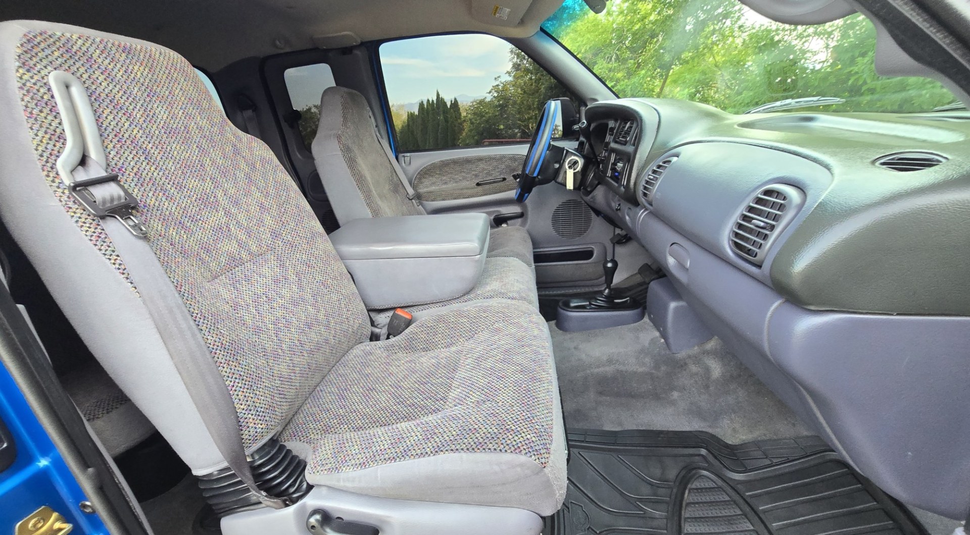 2001 Blue /Gray Dodge Ram 1500 Quad Cab short Bed 4WD (3B7HF13Z21G) with an 5.9L V8 OHV 16V engine, Automatic transmission, located at 450 N Russell, Missoula, MT, 59801, (406) 543-6600, 46.874496, -114.017433 - Nice Shiny Blue 4x4 Dodge with a 360 V8 (5.9L) Automatic Transmission. Nice Fuel Brand Wheels. Air Conditioning. Power Windows and Locks. Cruise Control. Clean Interior. Runs and Drives Great. Ready for you to Chrome Out or leave the way she looks, which is Fantastic.- Photo#17