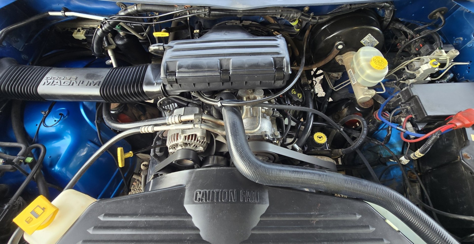 2001 Blue /Gray Dodge Ram 1500 Quad Cab short Bed 4WD (3B7HF13Z21G) with an 5.9L V8 OHV 16V engine, Automatic transmission, located at 450 N Russell, Missoula, MT, 59801, (406) 543-6600, 46.874496, -114.017433 - Nice Shiny Blue 4x4 Dodge with a 360 V8 (5.9L) Automatic Transmission. Nice Fuel Brand Wheels. Air Conditioning. Power Windows and Locks. Cruise Control. Clean Interior. Runs and Drives Great. Ready for you to Chrome Out or leave the way she looks, which is Fantastic.- Photo#20