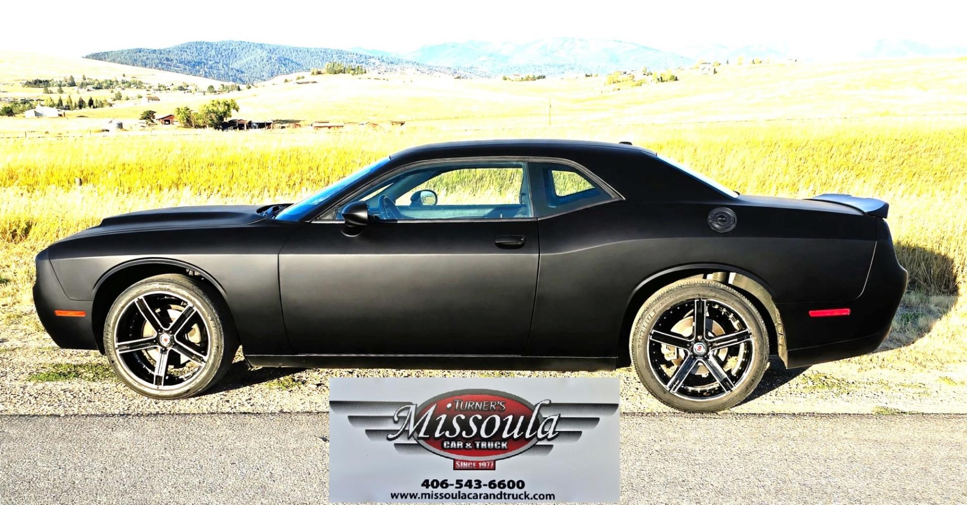 2020 Black /Black Dodge Challenger SXT (2C3CDZAG5LH) with an 3.6L V6 DOHC 24V engine, 8A transmission, located at 450 N Russell, Missoula, MT, 59801, (406) 543-6600, 46.874496, -114.017433 - WELL UNDER BOOK! Detroit Muscle with modern Fuel Economy.. 3.6L V6 Engine with 305 Horse Power. Yet still manages 30 mpg highway. 8 Speed Automatic Transmission. Rear Wheel Drive. Nice aftermarket Wheels with New Tires. Touchscreen Stereo and Climate Control. AM FM XM Radio. Apple Car Play. Android- Photo#1