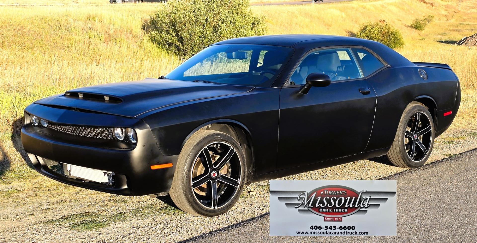 2020 Black /Black Dodge Challenger SXT (2C3CDZAG5LH) with an 3.6L V6 DOHC 24V engine, 8A transmission, located at 450 N Russell, Missoula, MT, 59801, (406) 543-6600, 46.874496, -114.017433 - WELL UNDER BOOK! Detroit Muscle with modern Fuel Economy.. 3.6L V6 Engine with 305 Horse Power. Yet still manages 30 mpg highway. 8 Speed Automatic Transmission. Rear Wheel Drive. Nice aftermarket Wheels with New Tires. Touchscreen Stereo and Climate Control. AM FM XM Radio. Apple Car Play. Android- Photo#0