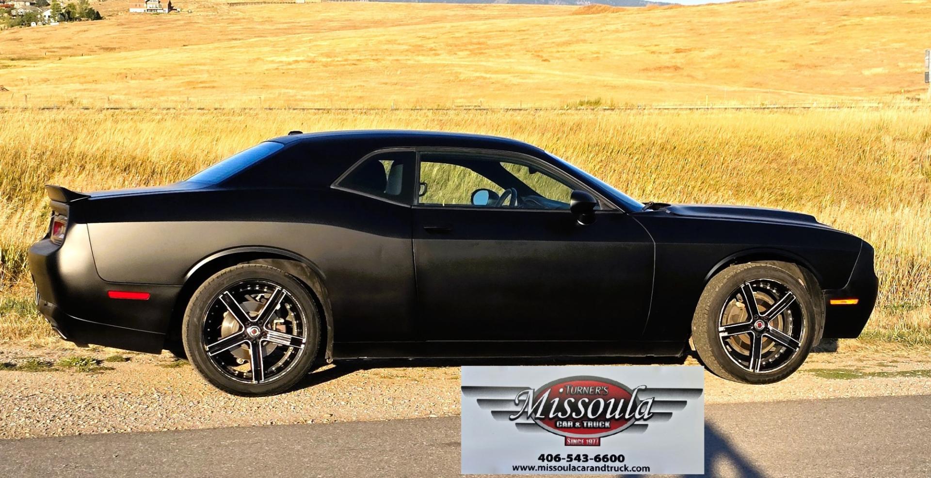 2020 Black /Black Dodge Challenger SXT (2C3CDZAG5LH) with an 3.6L V6 DOHC 24V engine, 8A transmission, located at 450 N Russell, Missoula, MT, 59801, (406) 543-6600, 46.874496, -114.017433 - WELL UNDER BOOK! Detroit Muscle with modern Fuel Economy.. 3.6L V6 Engine with 305 Horse Power. Yet still manages 30 mpg highway. 8 Speed Automatic Transmission. Rear Wheel Drive. Nice aftermarket Wheels with New Tires. Touchscreen Stereo and Climate Control. AM FM XM Radio. Apple Car Play. Android- Photo#4