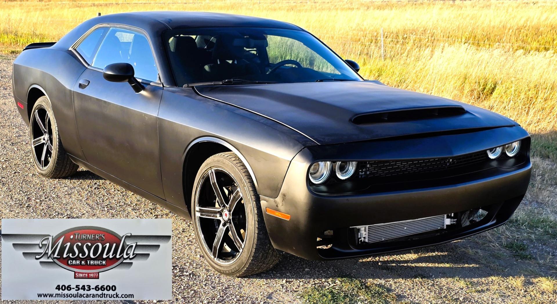 2020 Black /Black Dodge Challenger SXT (2C3CDZAG5LH) with an 3.6L V6 DOHC 24V engine, 8A transmission, located at 450 N Russell, Missoula, MT, 59801, (406) 543-6600, 46.874496, -114.017433 - WELL UNDER BOOK! Detroit Muscle with modern Fuel Economy.. 3.6L V6 Engine with 305 Horse Power. Yet still manages 30 mpg highway. 8 Speed Automatic Transmission. Rear Wheel Drive. Nice aftermarket Wheels with New Tires. Touchscreen Stereo and Climate Control. AM FM XM Radio. Apple Car Play. Android- Photo#7