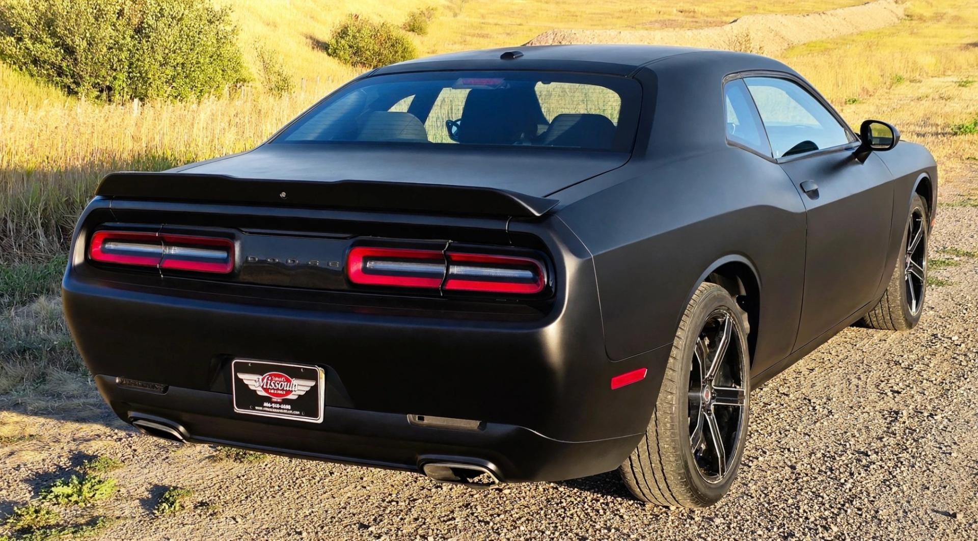 2020 Black /Black Dodge Challenger SXT (2C3CDZAG5LH) with an 3.6L V6 DOHC 24V engine, 8A transmission, located at 450 N Russell, Missoula, MT, 59801, (406) 543-6600, 46.874496, -114.017433 - WELL UNDER BOOK! Detroit Muscle with modern Fuel Economy.. 3.6L V6 Engine with 305 Horse Power. Yet still manages 30 mpg highway. 8 Speed Automatic Transmission. Rear Wheel Drive. Nice aftermarket Wheels with New Tires. Touchscreen Stereo and Climate Control. AM FM XM Radio. Apple Car Play. Android- Photo#8