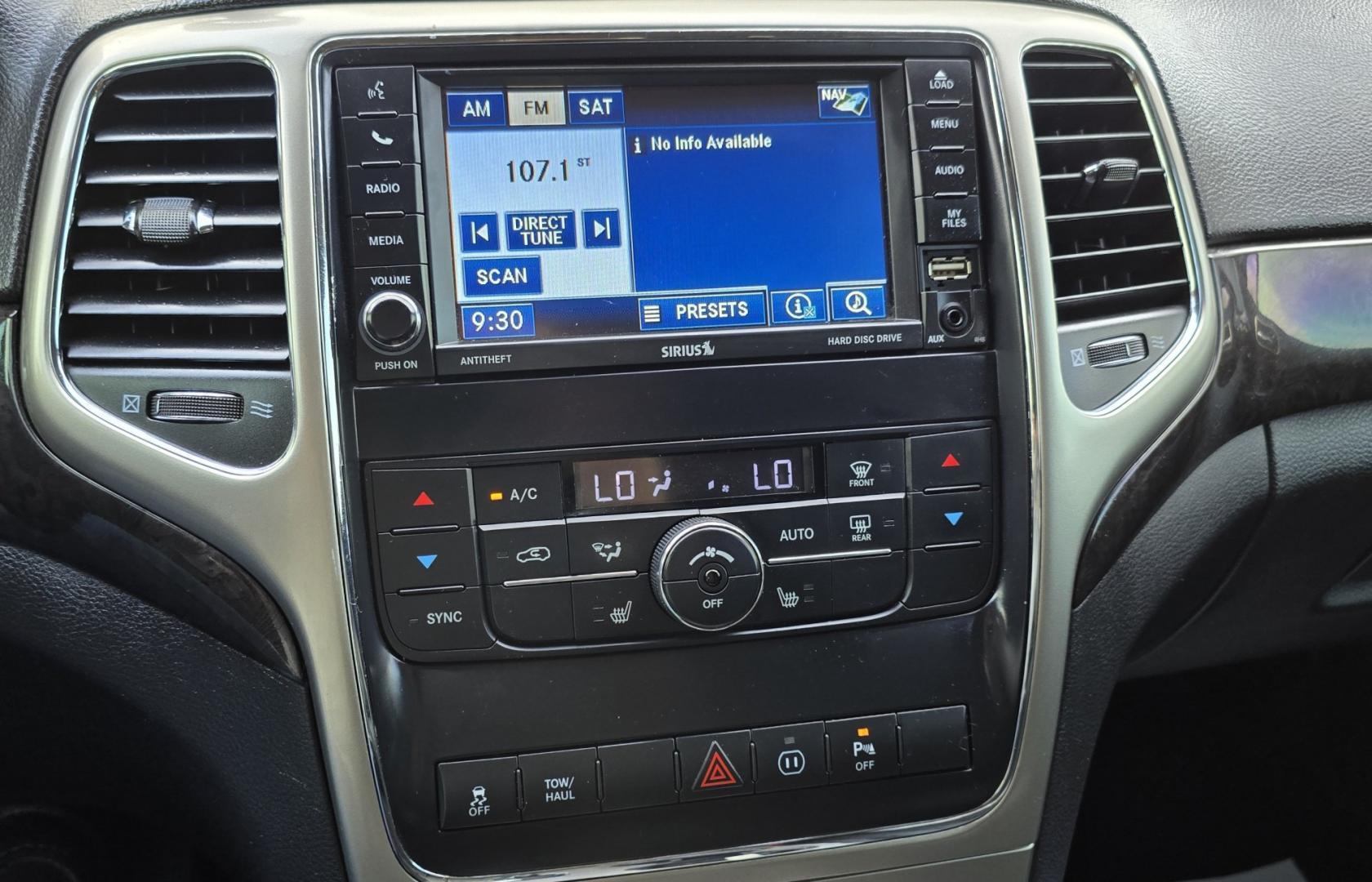 2012 Blue /Black Jeep Grand Cherokee Laredo 4WD (1C4RJFAT3CC) with an 5.7L V8 OHV 16V engine, 5-Speed Automatic transmission, located at 450 N Russell, Missoula, MT, 59801, (406) 543-6600, 46.874496, -114.017433 - Classy 4WD SUV. 5.7L Hemi V8 Engine. Automatic Transmission. Huge Panoramic Sunroof. Remote Ignition. Touch Screen Stereo. Bluetooth Audio and Phone Connection. Navigation. Air. Cruise. Tilt. Power Windows and Locks. New Struts and Shocks. Nice Aftermarket Wheels with like New Tires.- Photo#10