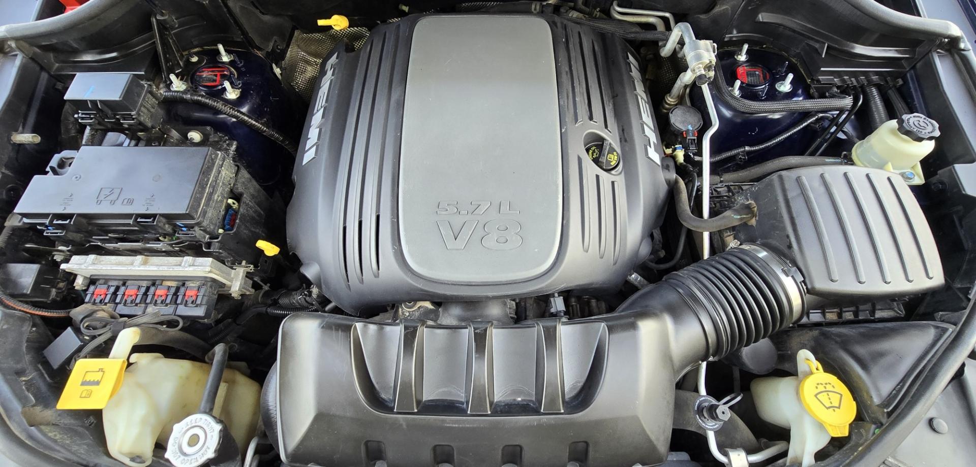2012 Blue /Black Jeep Grand Cherokee Laredo 4WD (1C4RJFAT3CC) with an 5.7L V8 OHV 16V engine, 5-Speed Automatic transmission, located at 450 N Russell, Missoula, MT, 59801, (406) 543-6600, 46.874496, -114.017433 - Classy 4WD SUV. 5.7L Hemi V8 Engine. Automatic Transmission. Huge Panoramic Sunroof. Remote Ignition. Touch Screen Stereo. Bluetooth Audio and Phone Connection. Navigation. Air. Cruise. Tilt. Power Windows and Locks. New Struts and Shocks. Nice Aftermarket Wheels with like New Tires.- Photo#19