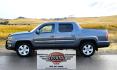 2010 Grey /Black Honda Ridgeline RTL (5FPYK1F58AB) with an 3.5L V6 SOHC 24V engine, 5A transmission, located at 450 N Russell, Missoula, MT, 59801, (406) 543-6600, 46.874496, -114.017433 - Hard to Find AWD Honda Ridgeline. Color is a Gray Green. 3.5L V6 Engine. Leather. Heated Front Seats. Power Sunroof. Power Windows and Locks. Navigation. AM FM XM CD Player. Air Conditioning Blows Cold. Heater Blows Hot. Tilt Steering. Cruise Control. Comfort of a SUV with the Practicality of a Truc- Photo#2