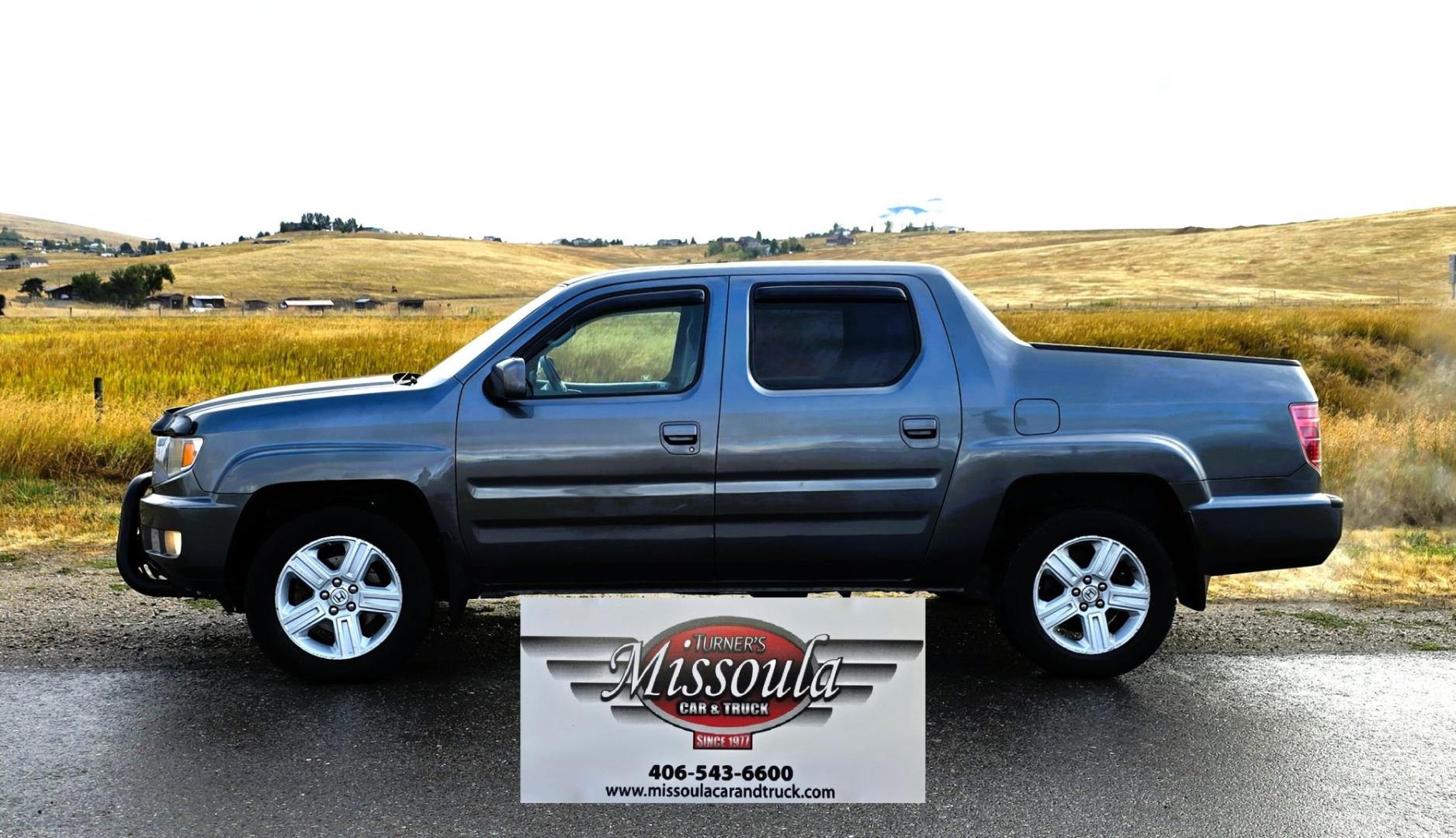 2010 Grey /Black Honda Ridgeline RTL (5FPYK1F58AB) with an 3.5L V6 SOHC 24V engine, 5A transmission, located at 450 N Russell, Missoula, MT, 59801, (406) 543-6600, 46.874496, -114.017433 - Hard to Find AWD Honda Ridgeline. Color is a Gray Green. 3.5L V6 Engine. Leather. Heated Front Seats. Power Sunroof. Power Windows and Locks. Navigation. AM FM XM CD Player. Air Conditioning Blows Cold. Heater Blows Hot. Tilt Steering. Cruise Control. Comfort of a SUV with the Practicality of a Truc- Photo#1