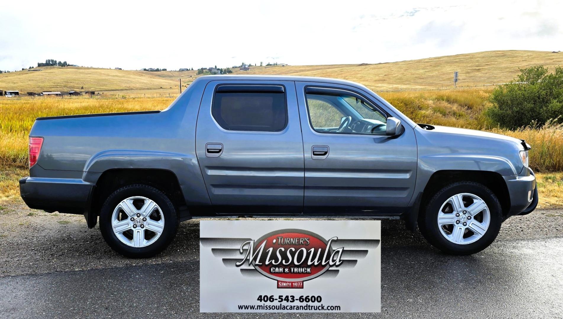 2010 Grey /Black Honda Ridgeline RTL (5FPYK1F58AB) with an 3.5L V6 SOHC 24V engine, 5A transmission, located at 450 N Russell, Missoula, MT, 59801, (406) 543-6600, 46.874496, -114.017433 - Hard to Find AWD Honda Ridgeline. Color is a Gray Green. 3.5L V6 Engine. Leather. Heated Front Seats. Power Sunroof. Power Windows and Locks. Navigation. AM FM XM CD Player. Air Conditioning Blows Cold. Heater Blows Hot. Tilt Steering. Cruise Control. Comfort of a SUV with the Practicality of a Truc- Photo#5