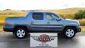 2010 Grey /Black Honda Ridgeline RTL (5FPYK1F58AB) with an 3.5L V6 SOHC 24V engine, 5A transmission, located at 450 N Russell, Missoula, MT, 59801, (406) 543-6600, 46.874496, -114.017433 - Hard to Find AWD Honda Ridgeline. Color is a Gray Green. 3.5L V6 Engine. Leather. Heated Front Seats. Power Sunroof. Power Windows and Locks. Navigation. AM FM XM CD Player. Air Conditioning Blows Cold. Heater Blows Hot. Tilt Steering. Cruise Control. Comfort of a SUV with the Practicality of a Truc- Photo#5