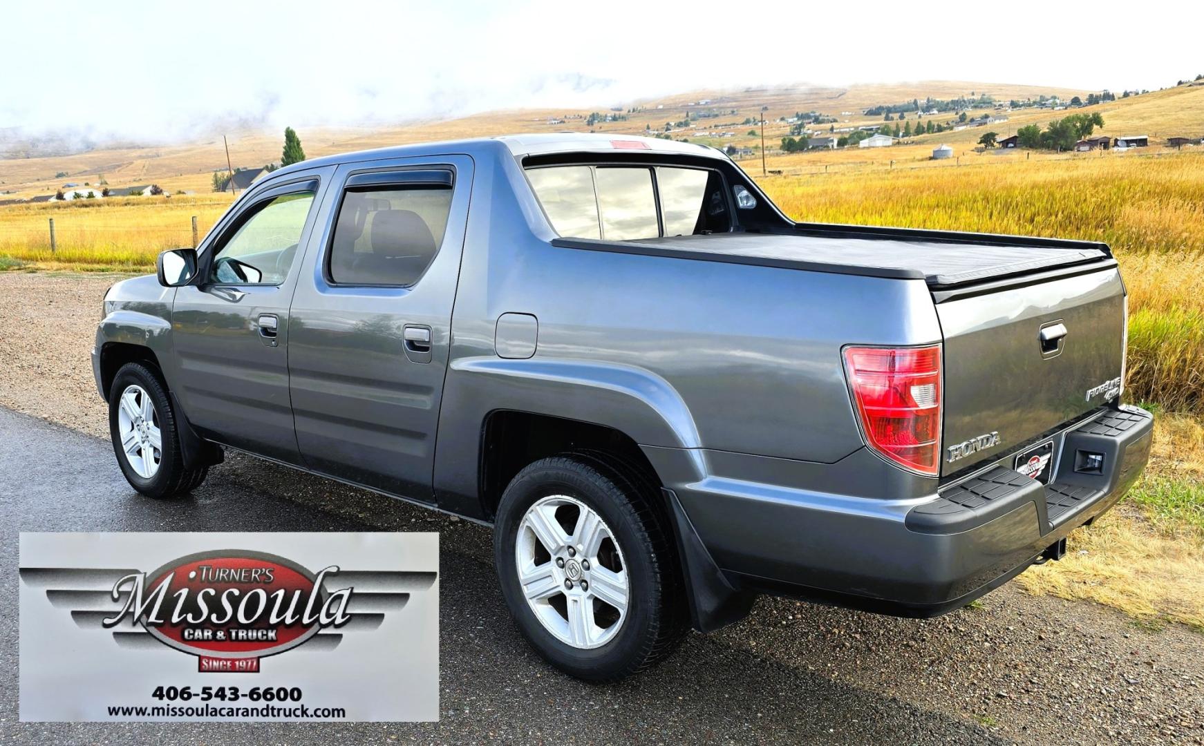 2010 Grey /Black Honda Ridgeline RTL (5FPYK1F58AB) with an 3.5L V6 SOHC 24V engine, 5A transmission, located at 450 N Russell, Missoula, MT, 59801, (406) 543-6600, 46.874496, -114.017433 - Hard to Find AWD Honda Ridgeline. Color is a Gray Green. 3.5L V6 Engine. Leather. Heated Front Seats. Power Sunroof. Power Windows and Locks. Navigation. AM FM XM CD Player. Air Conditioning Blows Cold. Heater Blows Hot. Tilt Steering. Cruise Control. Comfort of a SUV with the Practicality of a Truc- Photo#3