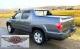 2010 Grey /Black Honda Ridgeline RTL (5FPYK1F58AB) with an 3.5L V6 SOHC 24V engine, 5A transmission, located at 450 N Russell, Missoula, MT, 59801, (406) 543-6600, 46.874496, -114.017433 - Hard to Find AWD Honda Ridgeline. Color is a Gray Green. 3.5L V6 Engine. Leather. Heated Front Seats. Power Sunroof. Power Windows and Locks. Navigation. AM FM XM CD Player. Air Conditioning Blows Cold. Heater Blows Hot. Tilt Steering. Cruise Control. Comfort of a SUV with the Practicality of a Truc- Photo#3