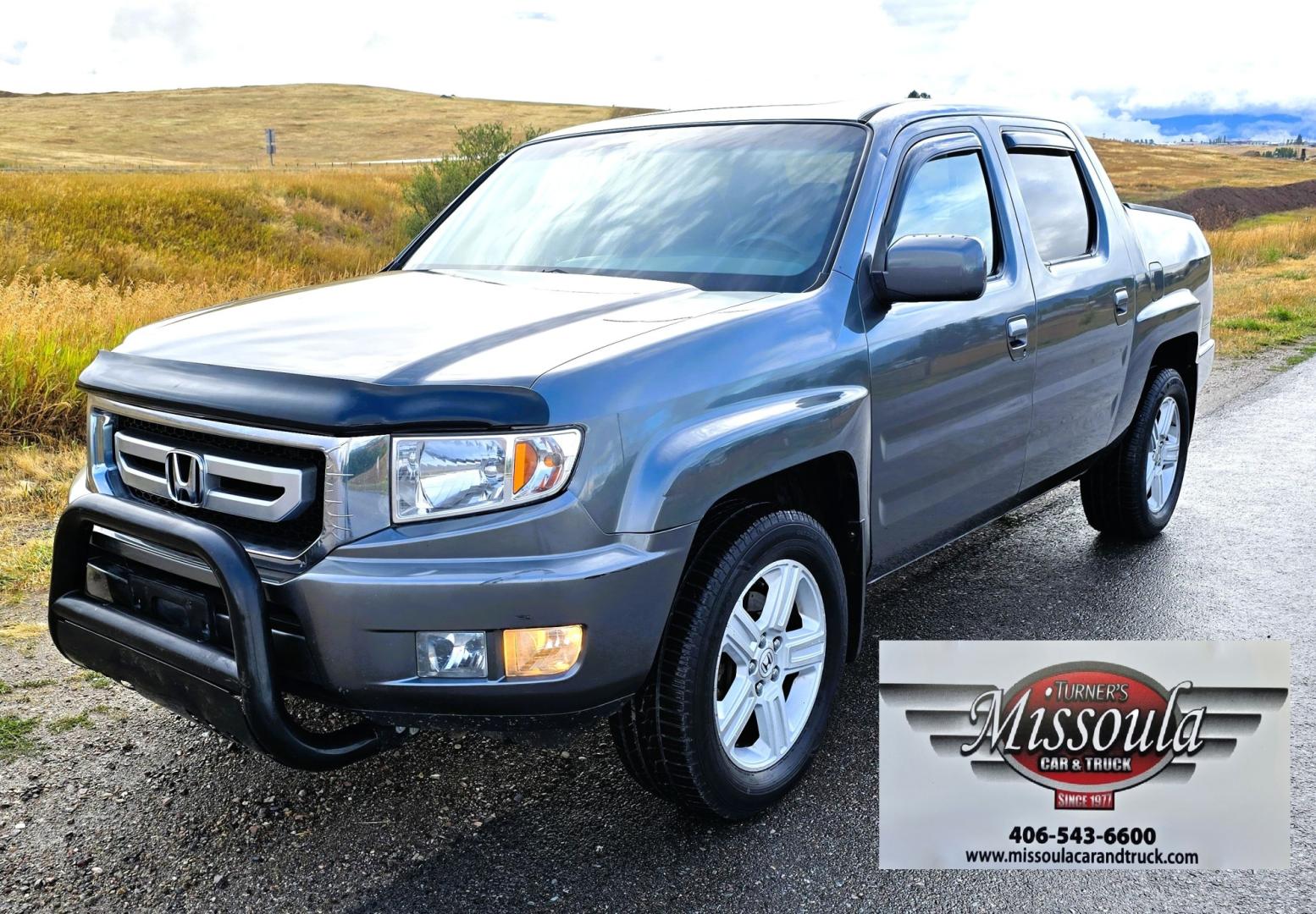 2010 Grey /Black Honda Ridgeline RTL (5FPYK1F58AB) with an 3.5L V6 SOHC 24V engine, 5A transmission, located at 450 N Russell, Missoula, MT, 59801, (406) 543-6600, 46.874496, -114.017433 - Hard to Find AWD Honda Ridgeline. Color is a Gray Green. 3.5L V6 Engine. Leather. Heated Front Seats. Power Sunroof. Power Windows and Locks. Navigation. AM FM XM CD Player. Air Conditioning Blows Cold. Heater Blows Hot. Tilt Steering. Cruise Control. Comfort of a SUV with the Practicality of a Truc- Photo#4