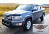 2010 Grey /Black Honda Ridgeline RTL (5FPYK1F58AB) with an 3.5L V6 SOHC 24V engine, 5A transmission, located at 450 N Russell, Missoula, MT, 59801, (406) 543-6600, 46.874496, -114.017433 - Hard to Find AWD Honda Ridgeline. Color is a Gray Green. 3.5L V6 Engine. Leather. Heated Front Seats. Power Sunroof. Power Windows and Locks. Navigation. AM FM XM CD Player. Air Conditioning Blows Cold. Heater Blows Hot. Tilt Steering. Cruise Control. Comfort of a SUV with the Practicality of a Truc- Photo#4