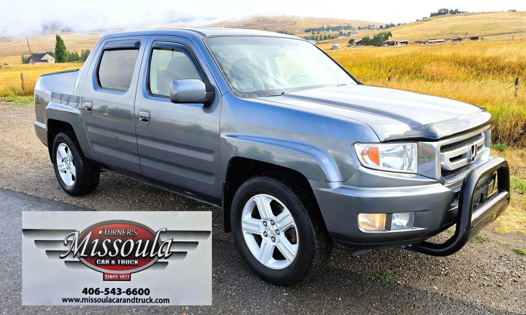 2010 Grey /Black Honda Ridgeline RTL (5FPYK1F58AB) with an 3.5L V6 SOHC 24V engine, 5A transmission, located at 450 N Russell, Missoula, MT, 59801, (406) 543-6600, 46.874496, -114.017433 - Hard to Find AWD Honda Ridgeline. Color is a Gray Green. 3.5L V6 Engine. Leather. Heated Front Seats. Power Sunroof. Power Windows and Locks. Navigation. AM FM XM CD Player. Air Conditioning Blows Cold. Heater Blows Hot. Tilt Steering. Cruise Control. Comfort of a SUV with the Practicality of a Truc- Photo#7