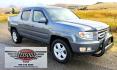 2010 Grey /Black Honda Ridgeline RTL (5FPYK1F58AB) with an 3.5L V6 SOHC 24V engine, 5A transmission, located at 450 N Russell, Missoula, MT, 59801, (406) 543-6600, 46.874496, -114.017433 - Hard to Find AWD Honda Ridgeline. Color is a Gray Green. 3.5L V6 Engine. Leather. Heated Front Seats. Power Sunroof. Power Windows and Locks. Navigation. AM FM XM CD Player. Air Conditioning Blows Cold. Heater Blows Hot. Tilt Steering. Cruise Control. Comfort of a SUV with the Practicality of a Truc- Photo#7