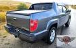 2010 Grey /Black Honda Ridgeline RTL (5FPYK1F58AB) with an 3.5L V6 SOHC 24V engine, 5A transmission, located at 450 N Russell, Missoula, MT, 59801, (406) 543-6600, 46.874496, -114.017433 - Hard to Find AWD Honda Ridgeline. Color is a Gray Green. 3.5L V6 Engine. Leather. Heated Front Seats. Power Sunroof. Power Windows and Locks. Navigation. AM FM XM CD Player. Air Conditioning Blows Cold. Heater Blows Hot. Tilt Steering. Cruise Control. Comfort of a SUV with the Practicality of a Truc- Photo#8