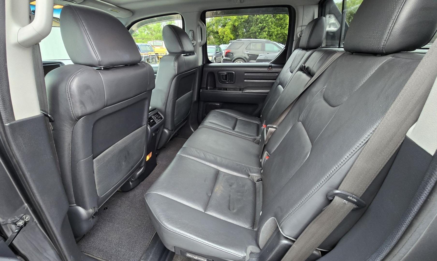 2010 Grey /Black Honda Ridgeline RTL (5FPYK1F58AB) with an 3.5L V6 SOHC 24V engine, 5A transmission, located at 450 N Russell, Missoula, MT, 59801, (406) 543-6600, 46.874496, -114.017433 - Hard to Find AWD Honda Ridgeline. Color is a Gray Green. 3.5L V6 Engine. Leather. Heated Front Seats. Power Sunroof. Power Windows and Locks. Navigation. AM FM XM CD Player. Air Conditioning Blows Cold. Heater Blows Hot. Tilt Steering. Cruise Control. Comfort of a SUV with the Practicality of a Truc- Photo#10