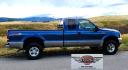 2004 Blue /Tan Ford F-250 SD Lariat SuperCab 4WD (1FTNX21S44E) with an 6.8L V10 SOHC 20V engine, Automatic transmission, located at 450 N Russell, Missoula, MT, 59801, (406) 543-6600, 46.874496, -114.017433 - Heavy Duty Beast of a 4WD Truck. Powerful V10 Engine. Automatic Transmission. Long Bed. Air. Cruise and Tilt. Power Windows and Locks. Torque Converter was Replaced and Tranny services at 137K Miles. Runs and Drives Amazing.- Photo#0