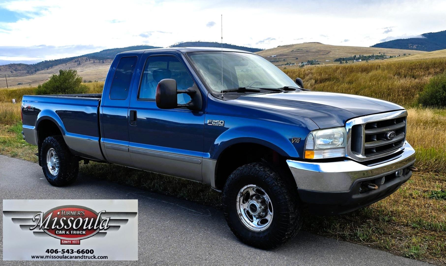 2004 Blue /Tan Ford F-250 SD Lariat SuperCab 4WD (1FTNX21S44E) with an 6.8L V10 SOHC 20V engine, Automatic transmission, located at 450 N Russell, Missoula, MT, 59801, (406) 543-6600, 46.874496, -114.017433 - Heavy Duty Beast of a 4WD Truck. Powerful V10 Engine. Automatic Transmission. Long Bed. Air. Cruise and Tilt. Power Windows and Locks. Torque Converter was Replaced and Tranny services at 137K Miles. Runs and Drives Amazing.- Photo#2