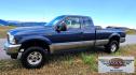 2004 Blue /Tan Ford F-250 SD Lariat SuperCab 4WD (1FTNX21S44E) with an 6.8L V10 SOHC 20V engine, Automatic transmission, located at 450 N Russell, Missoula, MT, 59801, (406) 543-6600, 46.874496, -114.017433 - Heavy Duty Beast of a 4WD Truck. Powerful V10 Engine. Automatic Transmission. Long Bed. Air. Cruise and Tilt. Power Windows and Locks. Torque Converter was Replaced and Tranny services at 137K Miles. Runs and Drives Amazing.- Photo#5