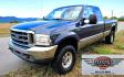 2004 Blue /Tan Ford F-250 SD Lariat SuperCab 4WD (1FTNX21S44E) with an 6.8L V10 SOHC 20V engine, Automatic transmission, located at 450 N Russell, Missoula, MT, 59801, (406) 543-6600, 46.874496, -114.017433 - Heavy Duty Beast of a 4WD Truck. Powerful V10 Engine. Automatic Transmission. Long Bed. Air. Cruise and Tilt. Power Windows and Locks. Torque Converter was Replaced and Tranny services at 137K Miles. Runs and Drives Amazing.- Photo#4