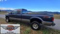 2004 Blue /Tan Ford F-250 SD Lariat SuperCab 4WD (1FTNX21S44E) with an 6.8L V10 SOHC 20V engine, Automatic transmission, located at 450 N Russell, Missoula, MT, 59801, (406) 543-6600, 46.874496, -114.017433 - Heavy Duty Beast of a 4WD Truck. Powerful V10 Engine. Automatic Transmission. Long Bed. Air. Cruise and Tilt. Power Windows and Locks. Torque Converter was Replaced and Tranny services at 137K Miles. Runs and Drives Amazing.- Photo#6