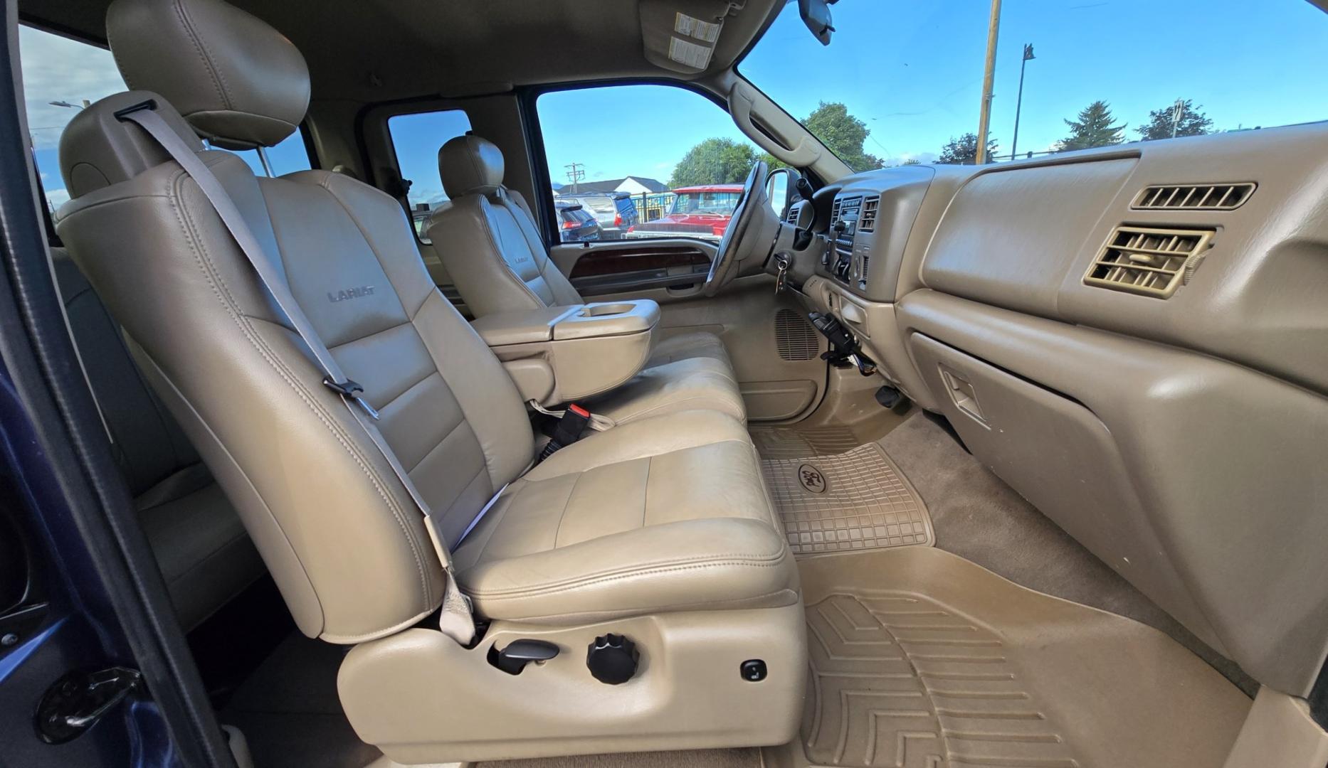 2004 Blue /Tan Ford F-250 SD Lariat SuperCab 4WD (1FTNX21S44E) with an 6.8L V10 SOHC 20V engine, Automatic transmission, located at 450 N Russell, Missoula, MT, 59801, (406) 543-6600, 46.874496, -114.017433 - Heavy Duty Beast of a 4WD Truck. Powerful V10 Engine. Automatic Transmission. Long Bed. Air. Cruise and Tilt. Power Windows and Locks. Torque Converter was Replaced and Tranny services at 137K Miles. Runs and Drives Amazing.- Photo#7