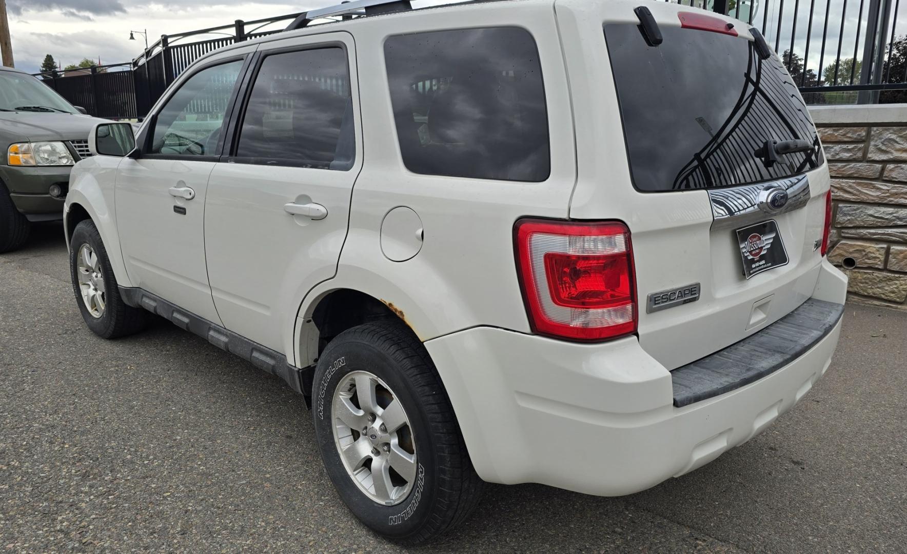 2011 White /Black Ford Escape Limited 4WD (1FMCU9EG3BK) with an 3.0L V6 DOHC 24V engine, 6A transmission, located at 450 N Russell, Missoula, MT, 59801, (406) 543-6600, 46.874496, -114.017433 - AWD SUV. Like New Bridgestone Tires. 3.0 V6 Engine. Automatic Transmission. AM FM CD Player. Bluetooth Phone Connectivity. Air Conditioning. Cruise Control. Power Heated Front Seats.. Power Windows and Locks. Clean Title and Carfax. We Finance through local Credit Unions. We do NOT offer In House- Photo#7