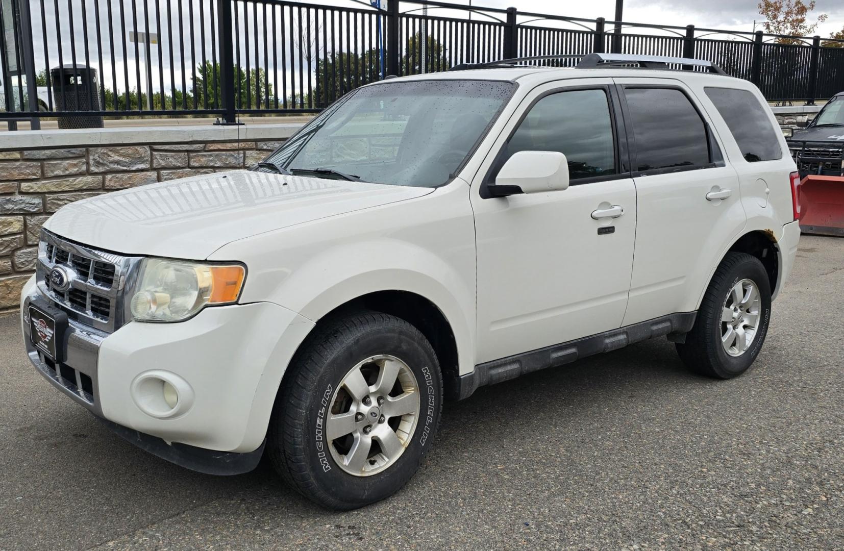2011 White /Black Ford Escape Limited 4WD (1FMCU9EG3BK) with an 3.0L V6 DOHC 24V engine, 6A transmission, located at 450 N Russell, Missoula, MT, 59801, (406) 543-6600, 46.874496, -114.017433 - AWD SUV. Like New Bridgestone Tires. 3.0 V6 Engine. Automatic Transmission. AM FM CD Player. Bluetooth Phone Connectivity. Air Conditioning. Cruise Control. Power Heated Front Seats.. Power Windows and Locks. Clean Title and Carfax. We Finance through local Credit Unions. We do NOT offer In House- Photo#6