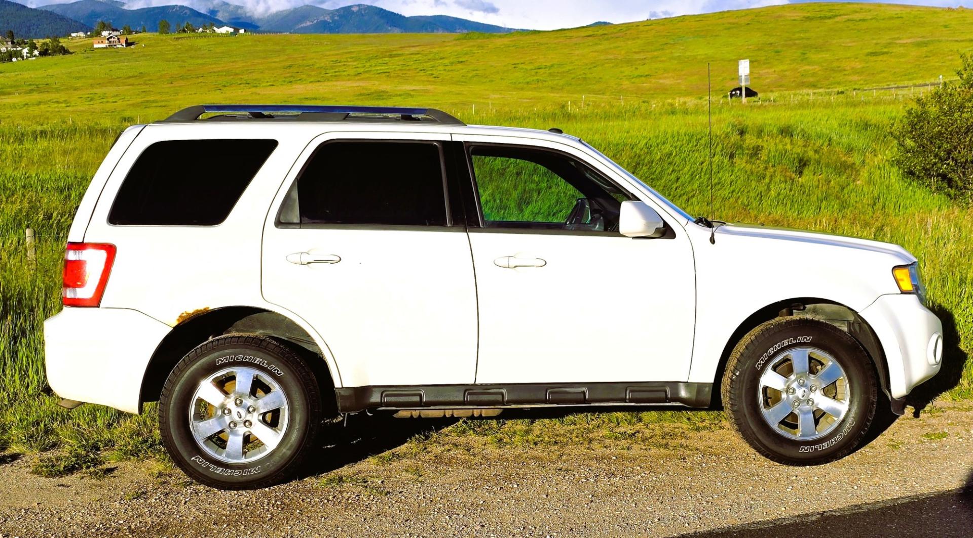 2011 White /Black Ford Escape Limited 4WD (1FMCU9EG3BK) with an 3.0L V6 DOHC 24V engine, 6A transmission, located at 450 N Russell, Missoula, MT, 59801, (406) 543-6600, 46.874496, -114.017433 - AWD SUV. Like New Bridgestone Tires. 3.0 V6 Engine. Automatic Transmission. AM FM CD Player. Bluetooth Phone Connectivity. Air Conditioning. Cruise Control. Power Heated Front Seats.. Power Windows and Locks. Clean Title and Carfax. We Finance through local Credit Unions. We do NOT offer In House- Photo#0