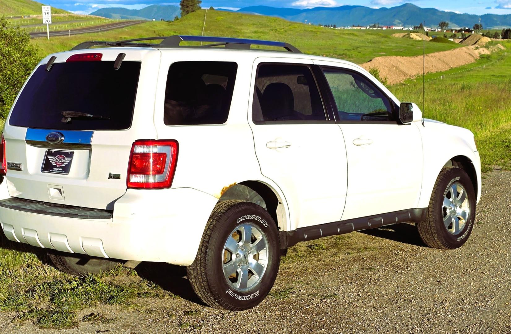 2011 White /Black Ford Escape Limited 4WD (1FMCU9EG3BK) with an 3.0L V6 DOHC 24V engine, 6A transmission, located at 450 N Russell, Missoula, MT, 59801, (406) 543-6600, 46.874496, -114.017433 - AWD SUV. Like New Bridgestone Tires. 3.0 V6 Engine. Automatic Transmission. AM FM CD Player. Bluetooth Phone Connectivity. Air Conditioning. Cruise Control. Power Heated Front Seats.. Power Windows and Locks. Clean Title and Carfax. We Finance through local Credit Unions. We do NOT offer In House- Photo#8