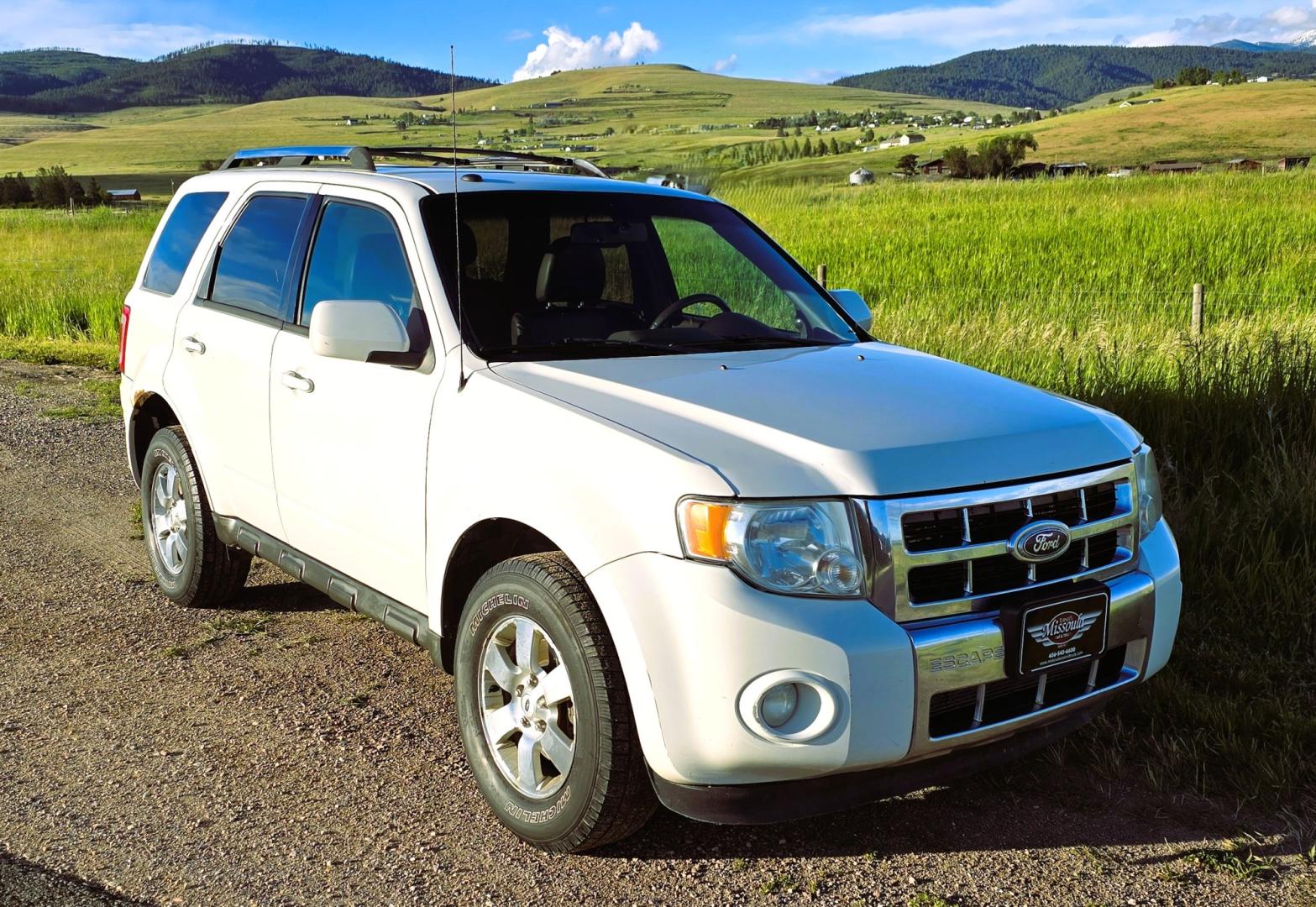 2011 White /Black Ford Escape Limited 4WD (1FMCU9EG3BK) with an 3.0L V6 DOHC 24V engine, 6A transmission, located at 450 N Russell, Missoula, MT, 59801, (406) 543-6600, 46.874496, -114.017433 - AWD SUV. Like New Bridgestone Tires. 3.0 V6 Engine. Automatic Transmission. AM FM CD Player. Bluetooth Phone Connectivity. Air Conditioning. Cruise Control. Power Heated Front Seats.. Power Windows and Locks. Clean Title and Carfax. We Finance through local Credit Unions. We do NOT offer In House- Photo#2